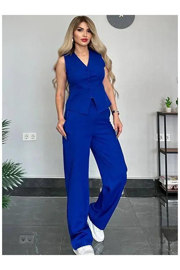 طقم صدرية وبنطال أنيق بخصّة ضيقة كحلي